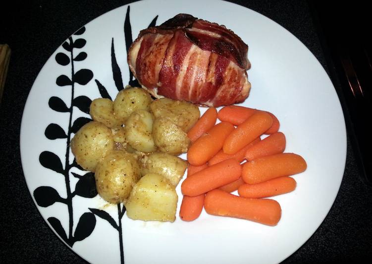 Bacon wrapped, stuffed Chicken Breast
