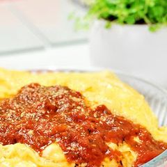 A picture of Omurice In Tomato Sauce.