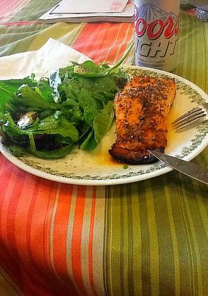 A picture of Baked Salmon With Spinach Salad.