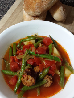 A picture of Portuguese Linguica and Green Beans.