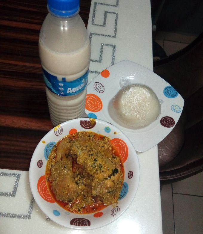 A picture of Pounded yam and egusi soup.