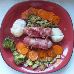 A picture of 'Pigs-in-blankets' roast.