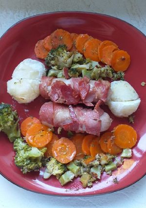 A picture of 'Pigs-in-blankets' roast.