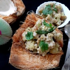 A picture of Phulkopir Dab Malai/ Malai Cauliflower with Green Coconut.