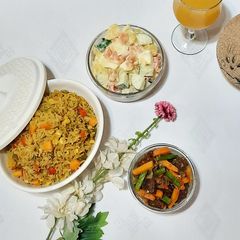A picture of Fried rice with Irish potato salad.