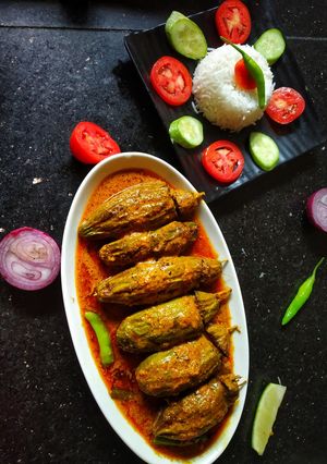 A picture of Chingri Potoler Dolma(Stuffed Parwal).