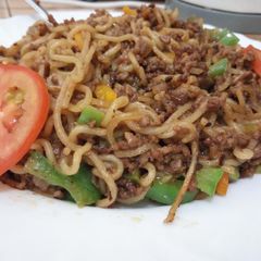 A picture of Stir fried noodles with minced meat.