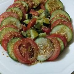 A picture of Cucumber and tomato salad.
