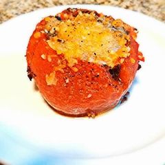 A picture of Mushroom stuffed tomatoes.