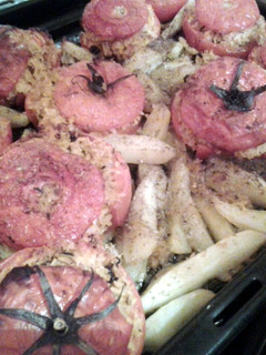 A picture of Greek stuffed tomatoes.