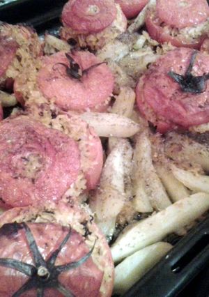 A picture of Greek stuffed tomatoes.
