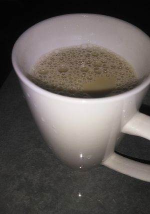 Una foto de Agua de panela con leche y canela