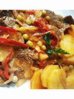 Una foto de Bifes a la criolla