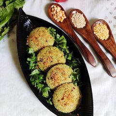 Mix daal and spinach idli with podi A picture of Mix daal and spinach idli with podi.