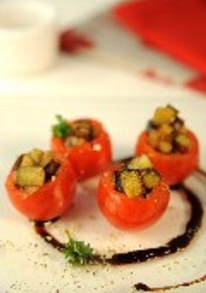Una foto de Aperitivo de tomates cherry y berenjena