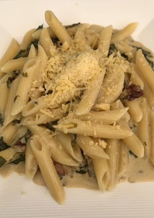 Una foto de Penne con kale