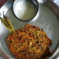 A picture of Masala roti with spicy chilli.