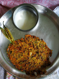 A picture of Masala roti with spicy chilli.