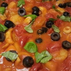 A picture of Seppie e patate in umido squid and potato stew.