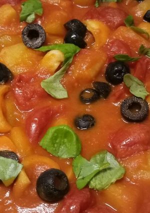 A picture of Seppie e patate in umido squid and potato stew.