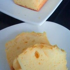 A picture of Sweet Potato Bites-like Cake Topped with Apples.