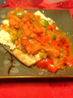 A picture of Mahi Mahi With Creole Sauce.