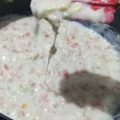 A picture of Vegetable cheese dip/sauce.