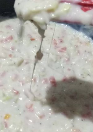 A picture of Vegetable cheese dip/sauce.