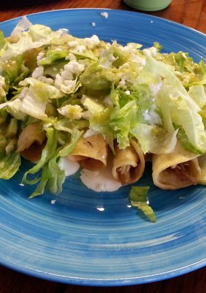 A picture of chicken flautas (tacos dorados).