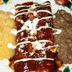 A picture of Mole Poblano Shrimp Enchiladas'.