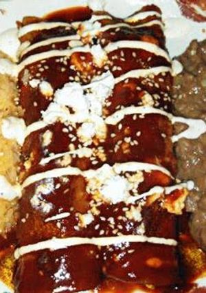 A picture of Mole Poblano Shrimp Enchiladas'.