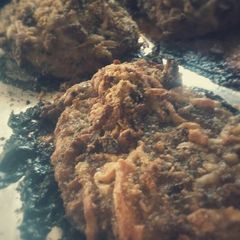 A picture of Bacon cheesy breaded pork chops.