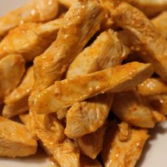 A picture of Buffalo Chicken Strips with Blue Cheese Dip.