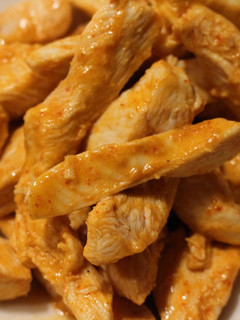 A picture of Buffalo Chicken Strips with Blue Cheese Dip.