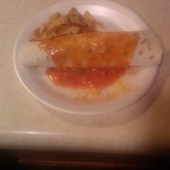 A picture of Frito loaded enchiladas.