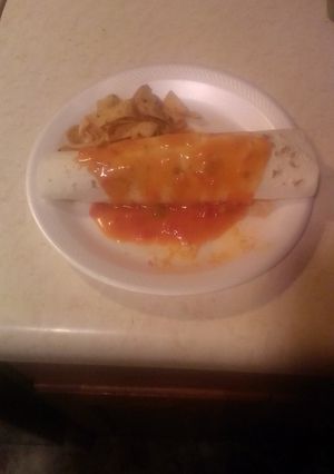 A picture of Frito loaded enchiladas.