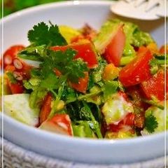 A picture of Octopus, Avocado, and Tomato Salad with Cilantro.