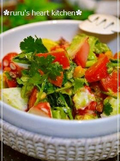 A picture of Octopus, Avocado, and Tomato Salad with Cilantro.