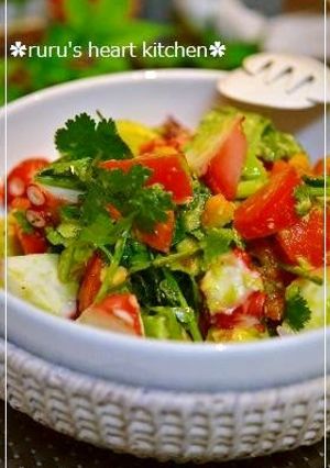 A picture of Octopus, Avocado, and Tomato Salad with Cilantro.