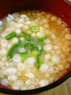 A picture of Miso Soup with Tempura Crumbs.