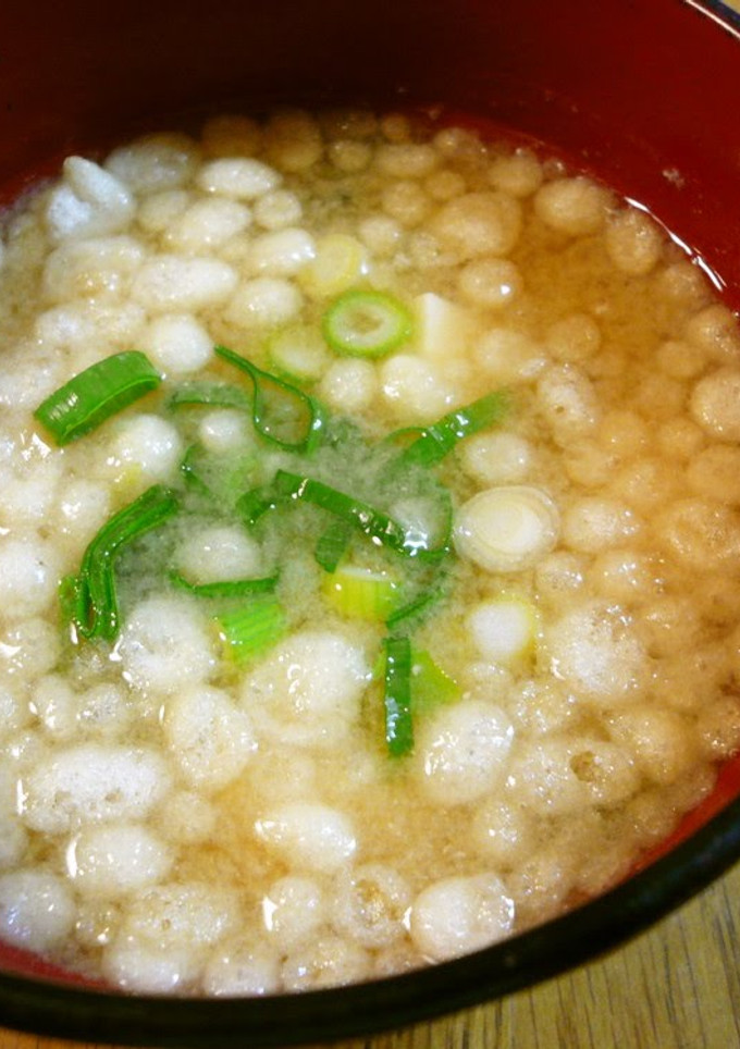 A picture of Miso Soup with Tempura Crumbs.