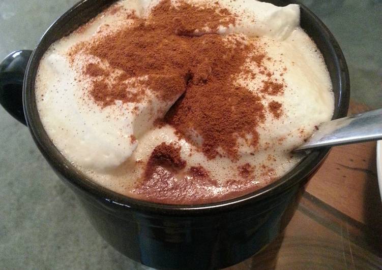 Coffee with cinnamon and whipped cream