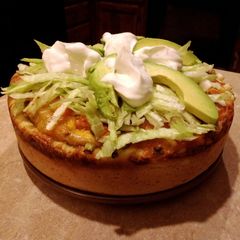 A picture of Deep dish taco pizza.