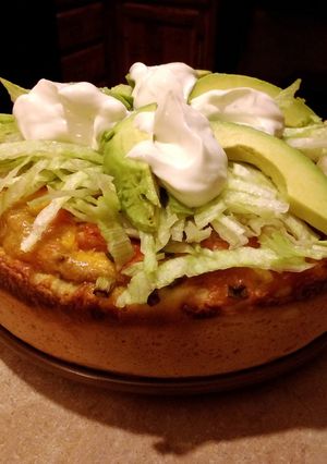 A picture of Deep dish taco pizza.