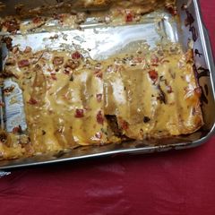 A picture of Queso Enchiladas.