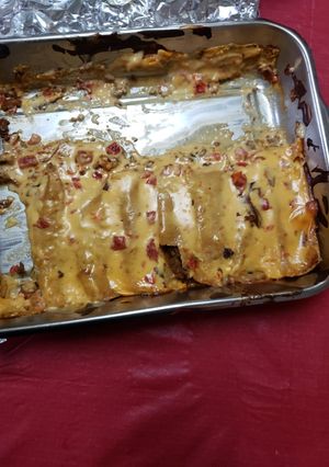 A picture of Queso Enchiladas.