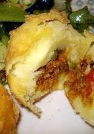 A picture of Stuffed potato balls. Rellenos de papa.