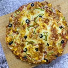 A picture of Paneer Palangtod Pizza.