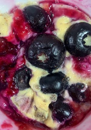 Una foto de Cheesecake de Arándanos y canela (en microondas estilo mug cake)