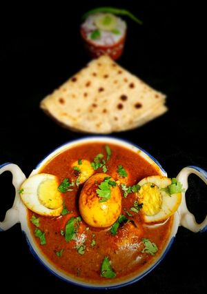 A picture of Kollhapuri Egg Curry.